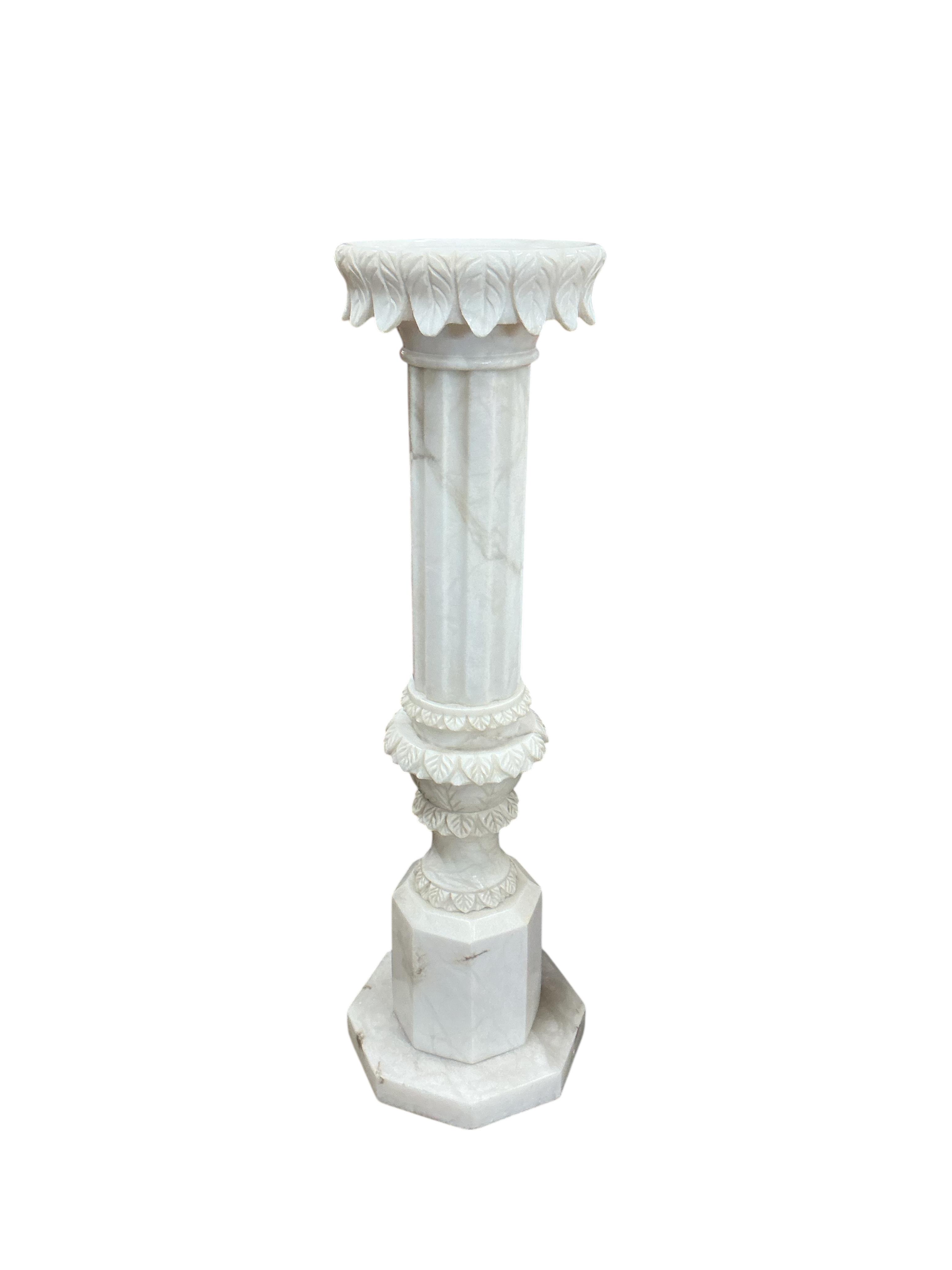 An alabaster pedestal, height 95cm